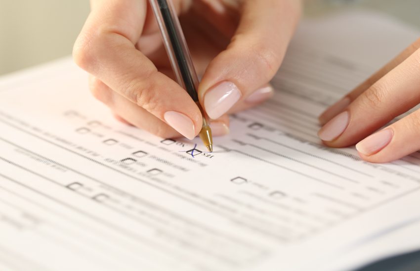 Close up of woman hands filling form - Shipping Packing Declaration Template concept