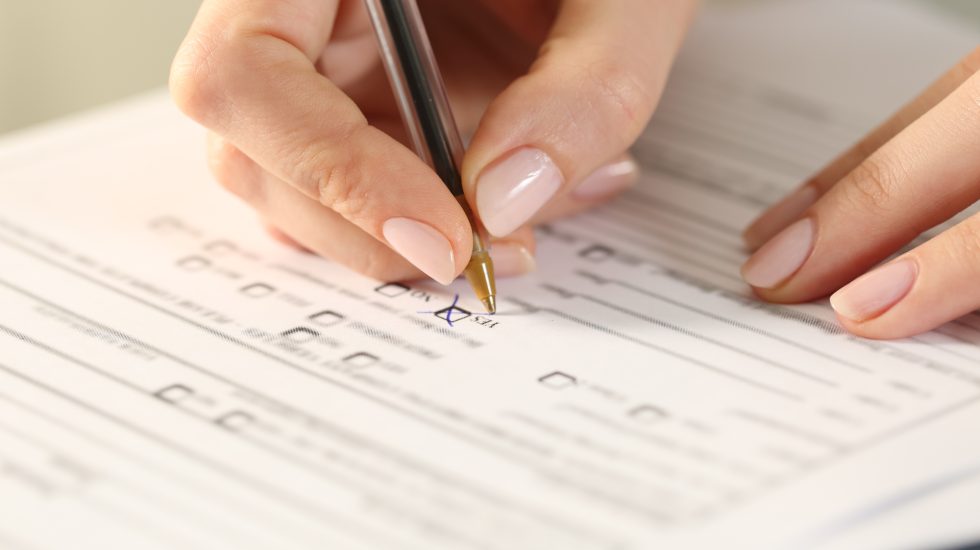 Close up of woman hands filling form - Shipping Packing Declaration Template concept