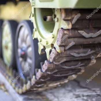 Close view of the detail on a military tank Military Cargo & Military Vessels learn more >